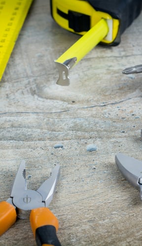 Tools laid out on a wooden surface